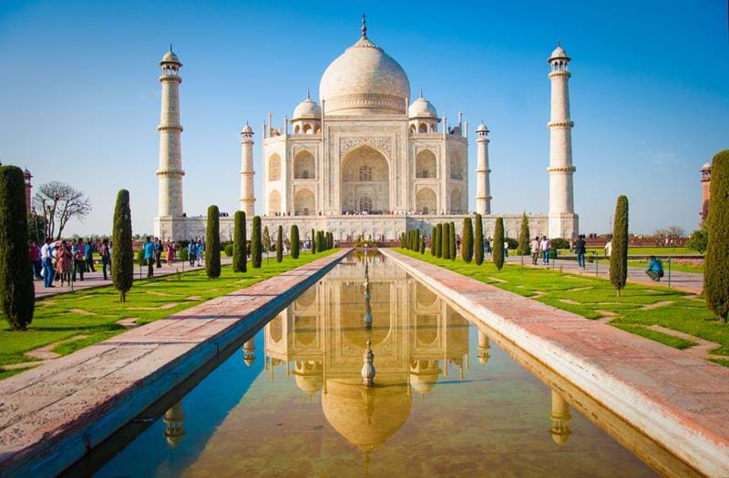 View of the Taj Mahal with thinner crowds while visiting India during the monsoon season