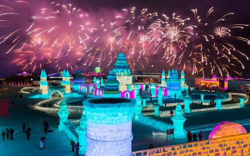 Fireworks display over the ice and snow sculptures of Harbin's annual festival