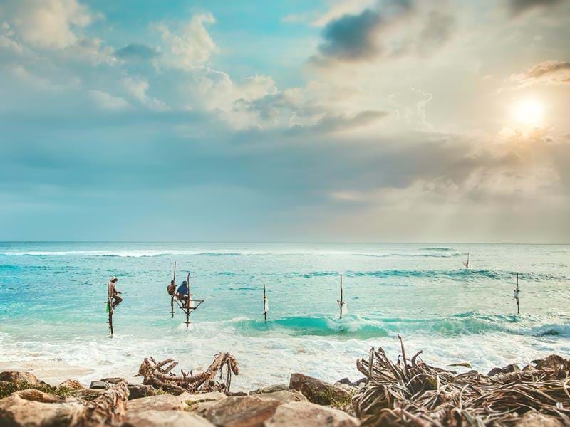 See traditional Sri Lankan Fishermen on a Sri Lanka holiday